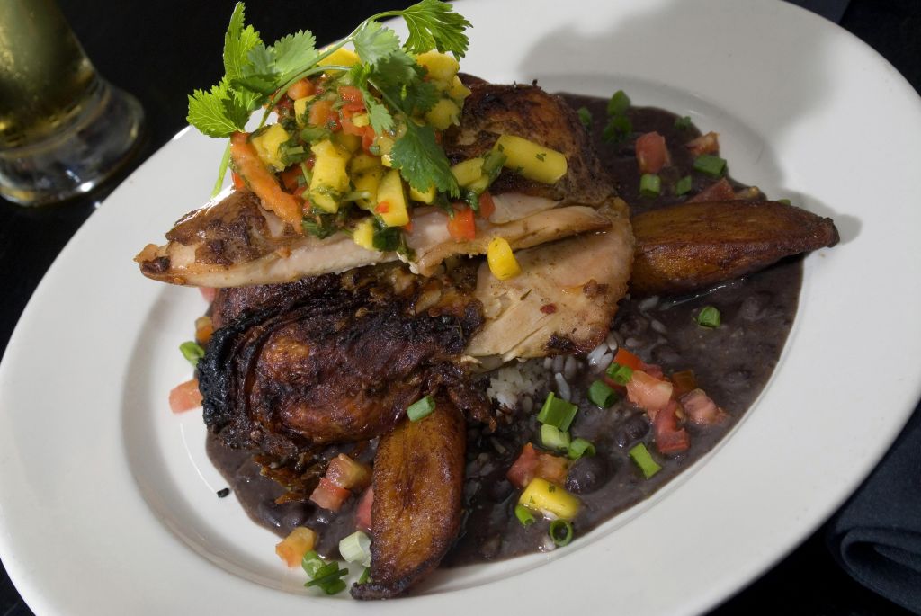 Festive jerk chicken with black beans and rice