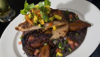 Festive jerk chicken with black beans and rice