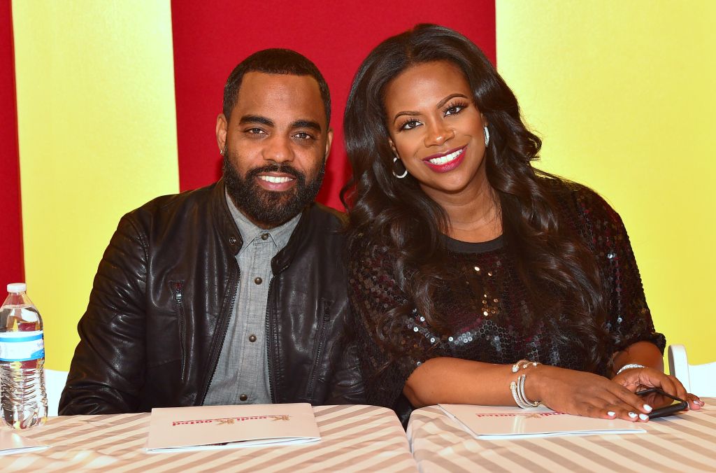 Kandi Burruss' White Logo Track Suit