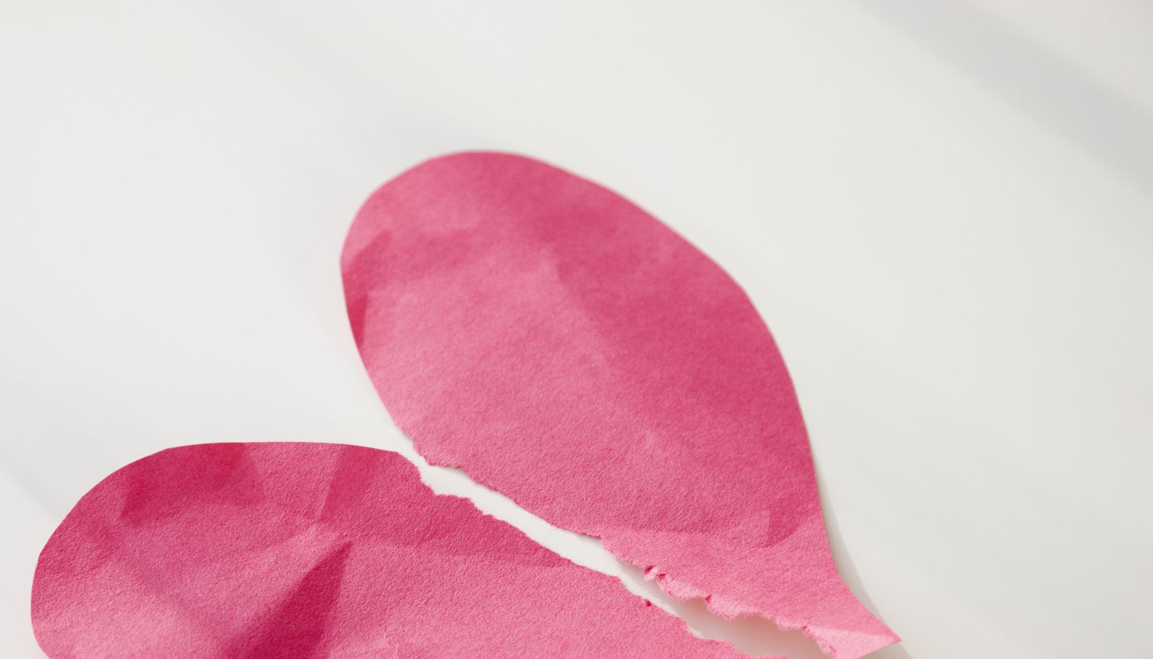 Paper heart ripped in half