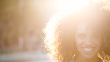 Woman with beautiful afro looking at camera.