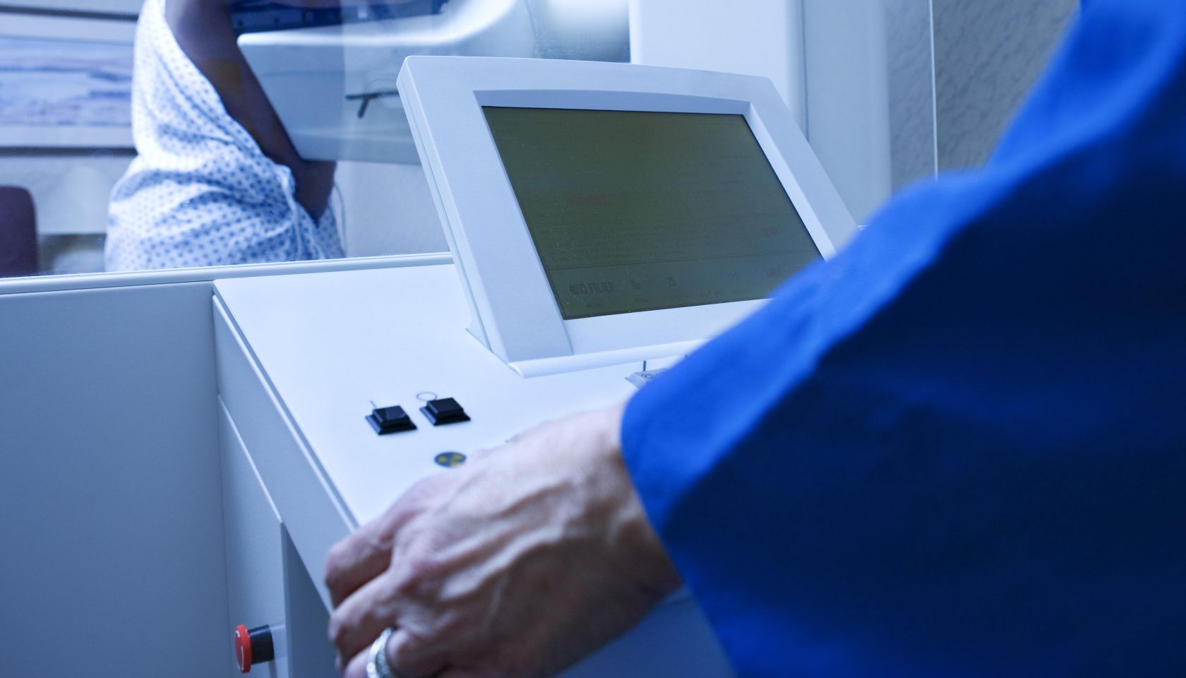 Woman getting mammogram