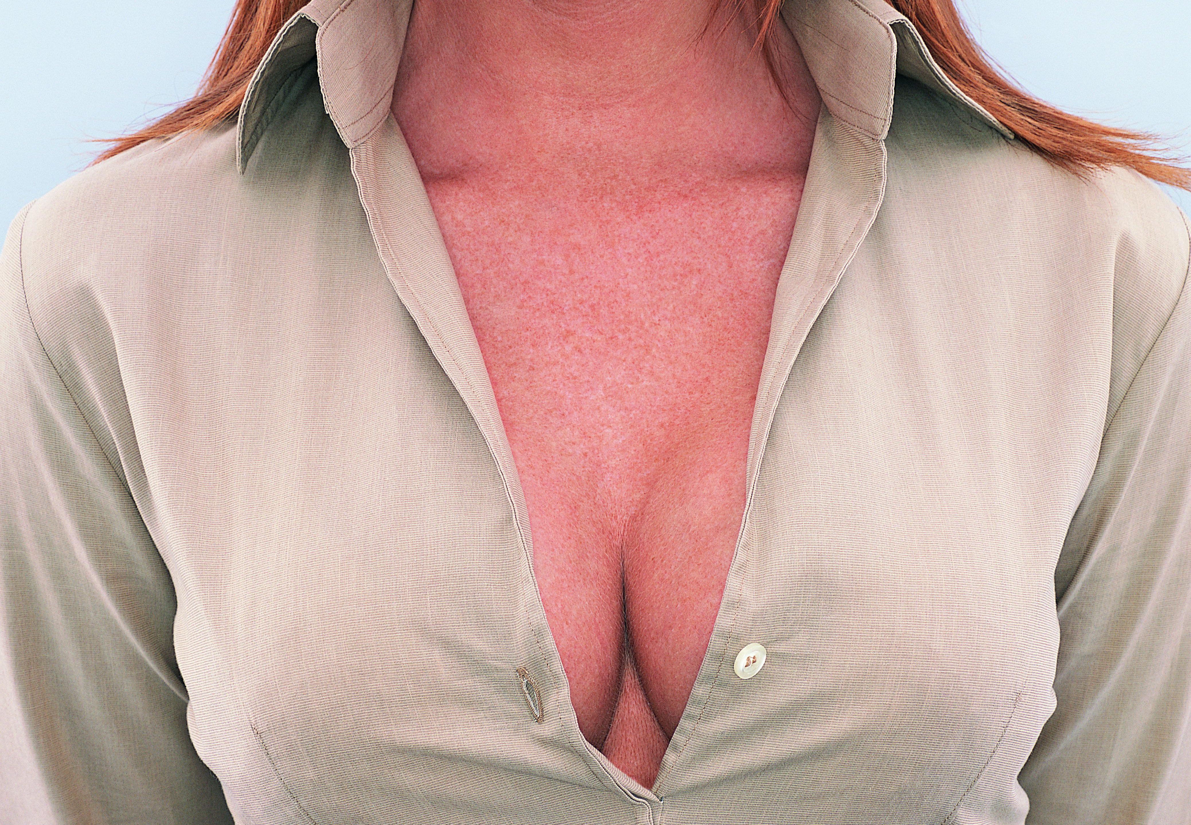 Mid Section View of a Young Businesswoman's Cleavage