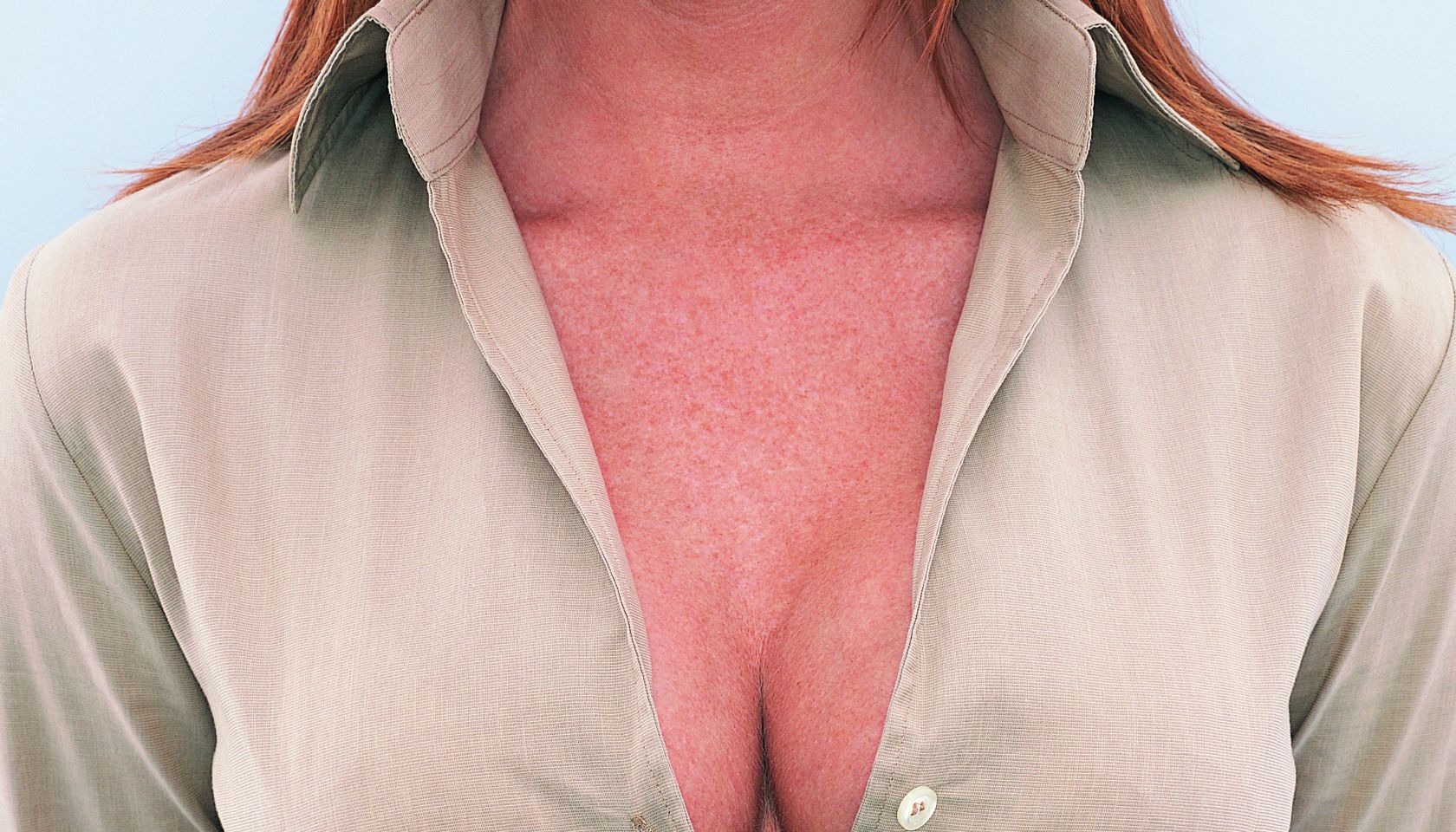 Mid Section View of a Young Businesswoman's Cleavage