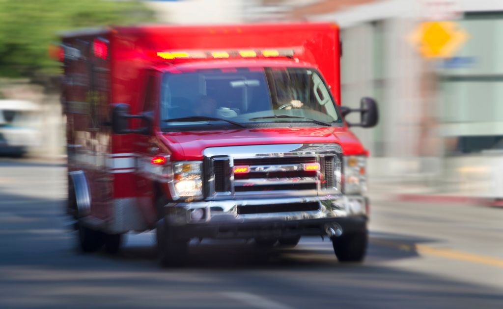 Ambulance hurrying through city streets