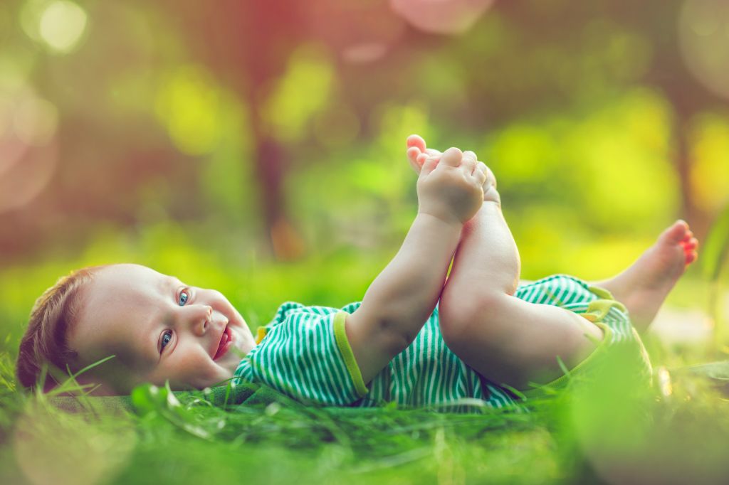 Cute baby outdoors in summer