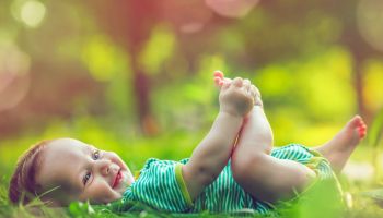 Cute baby outdoors in summer
