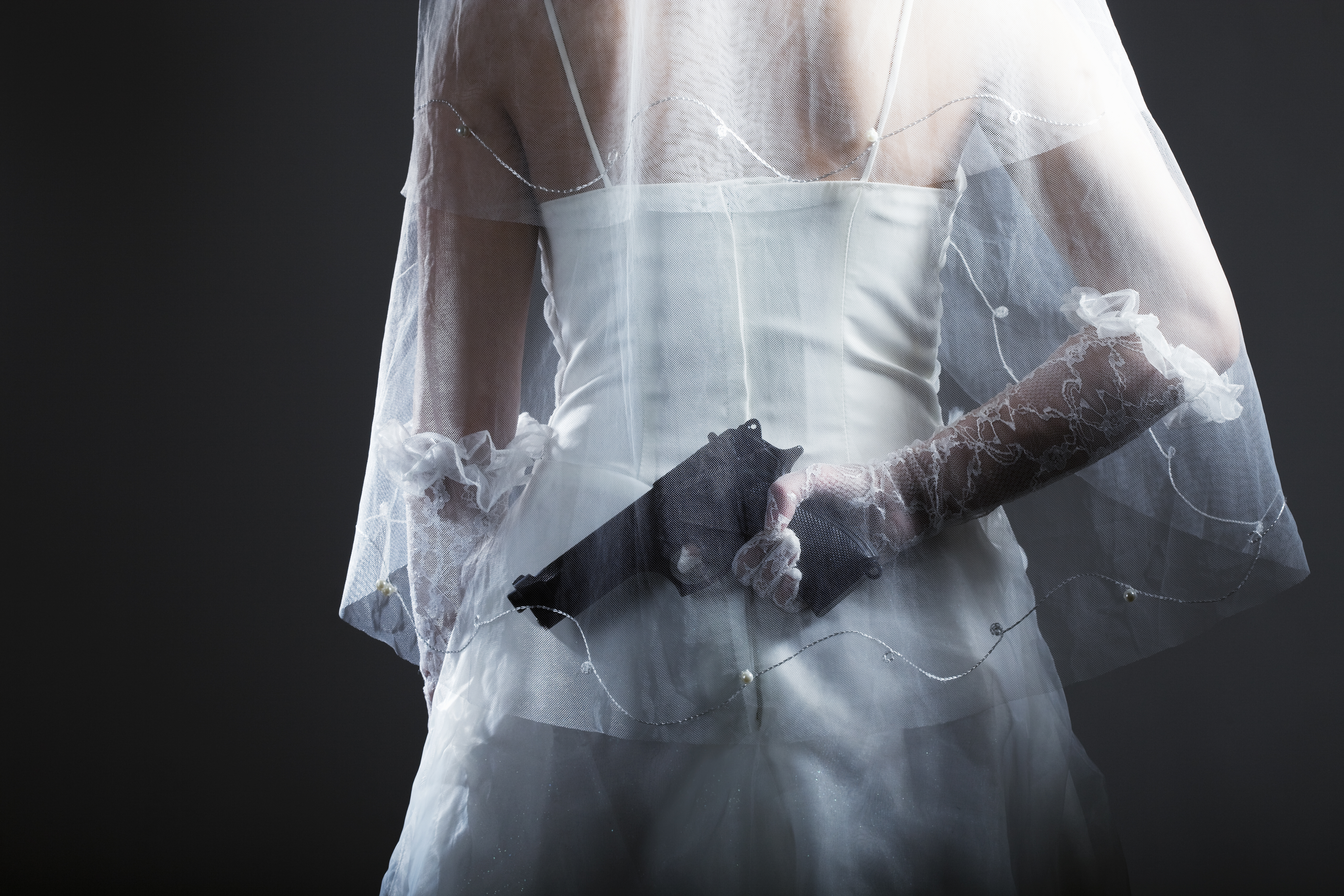 Bride with handgun