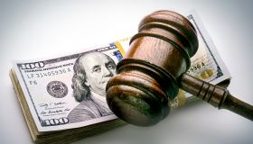judge's gavel on money