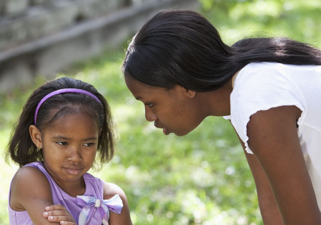 African American mother disciplining daughter