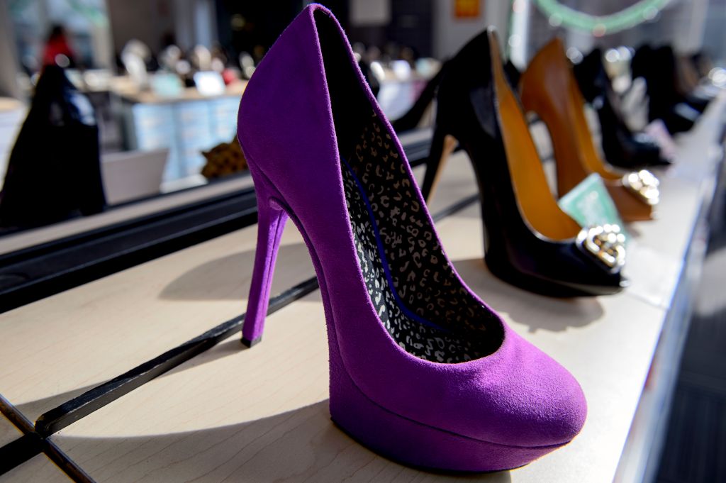 Violet colored high heels shoes at sheo store in San Francisco city, USA