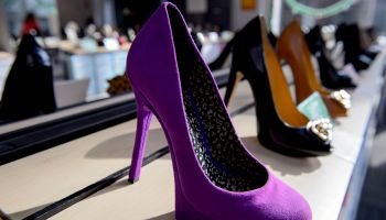 Violet colored high heels shoes at sheo store in San Francisco city, USA