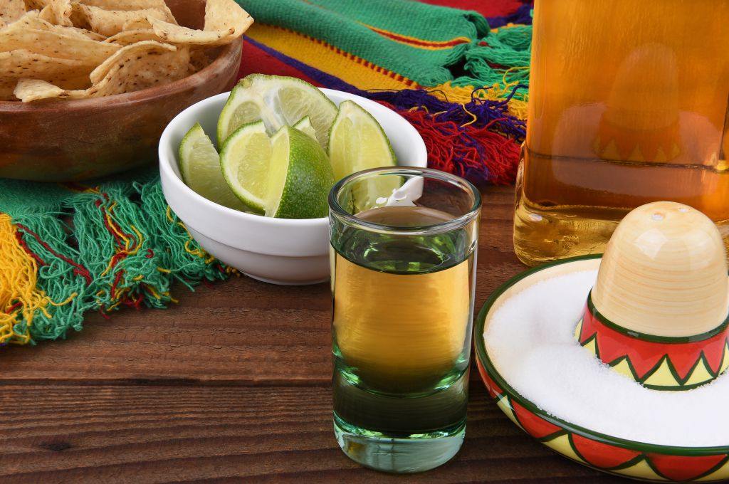 Close-Up Of Tequila Shot And Lime