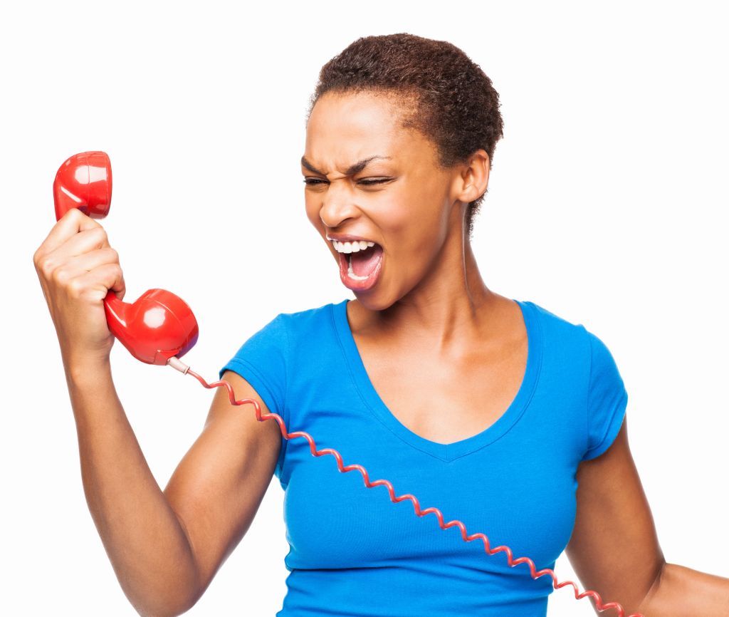 African American Woman Screaming On a Phone Call - Isolated