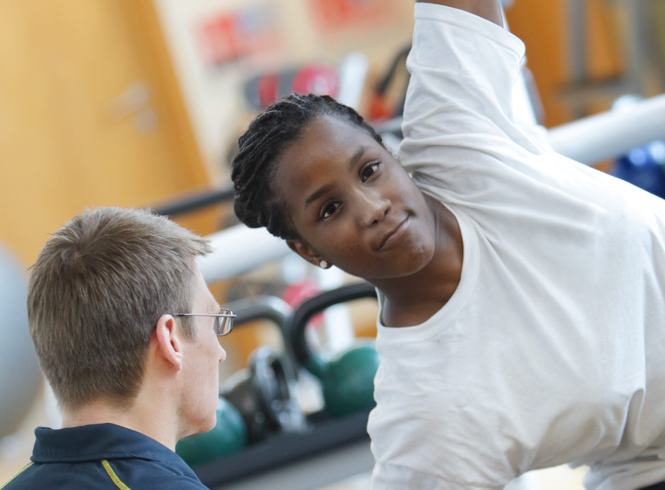 Lady working out with personal trainer