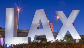 LAX sign at entrance to Los Angeles International Airport.