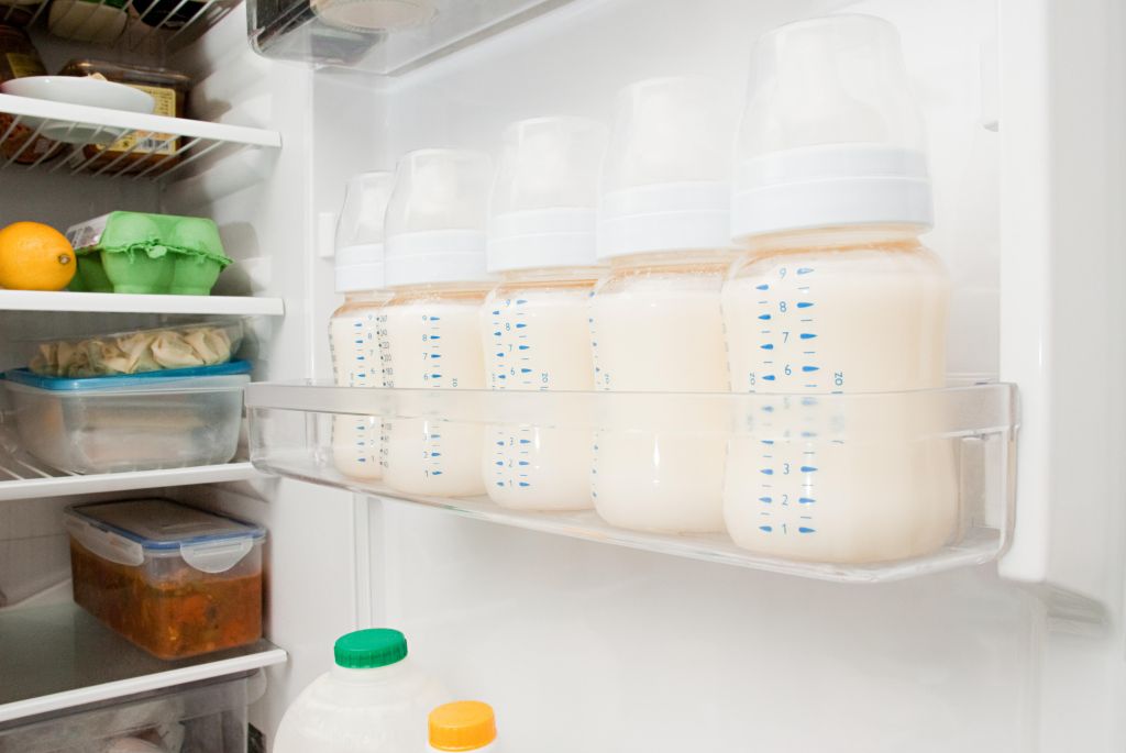 Bottles of breast milk in refrigerator