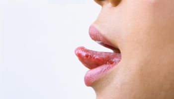 close-up of a woman sticking her tongue out