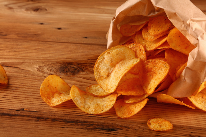 High Angle View Of Potato Chips On Table