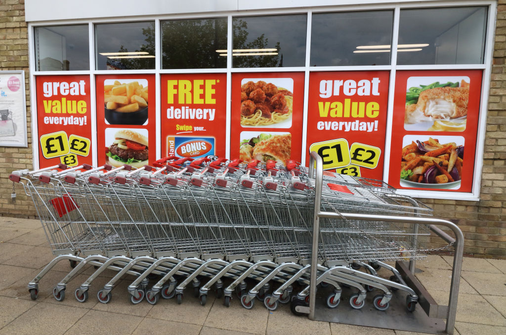 Shopping trolleys seen outside an Iceland store, One of the...