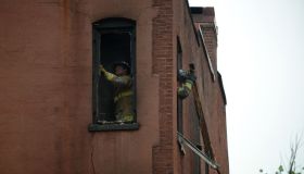 WASHINGTON, DC - JUNE 3: DC fire fighters clean out debris whil