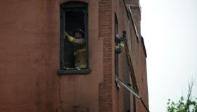 WASHINGTON, DC - JUNE 3: DC fire fighters clean out debris whil