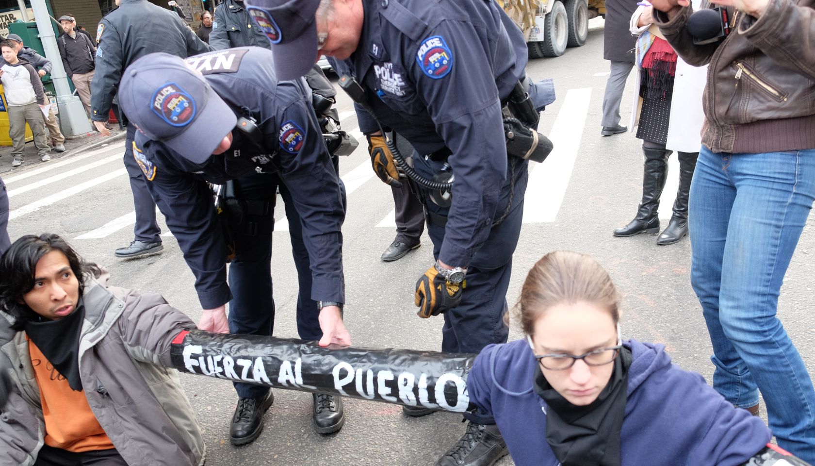 A protest against the U.S. deportation of undocumented immigrants blocks traffic on 7th Avenue in Manhattan