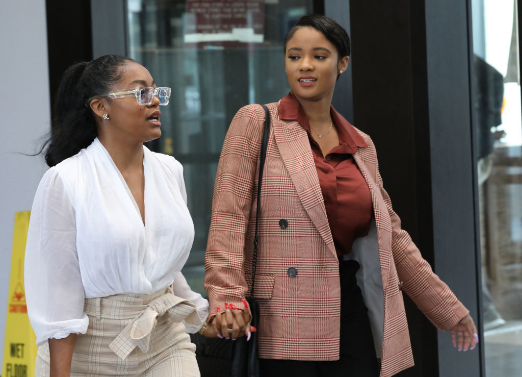 R. Kelly's girlfriends clash at Trump Tower in Chicago, sending one to a hospital while other is charged with domestic batteru