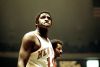 Willis Reed, Center, of the New York Knicks grimaces while waiting for the Boston Celtics to shoot free-throws during an NBA basketball game at Madison Square Garden on November 8, 1973.