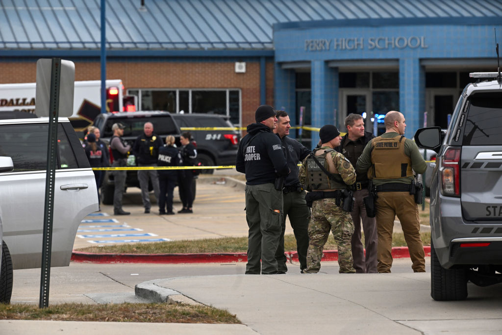 Law Enforcement Officers Investigate A Mass Shooting At Perry High School In Perry Iowa